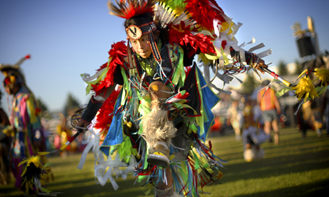 A young powwow dancer